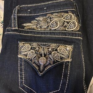 27 miss me, mis rise boot cut.